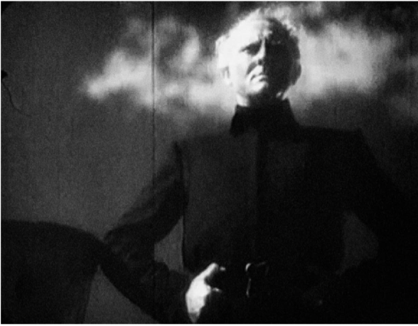 Peter Voss as the figure of Death