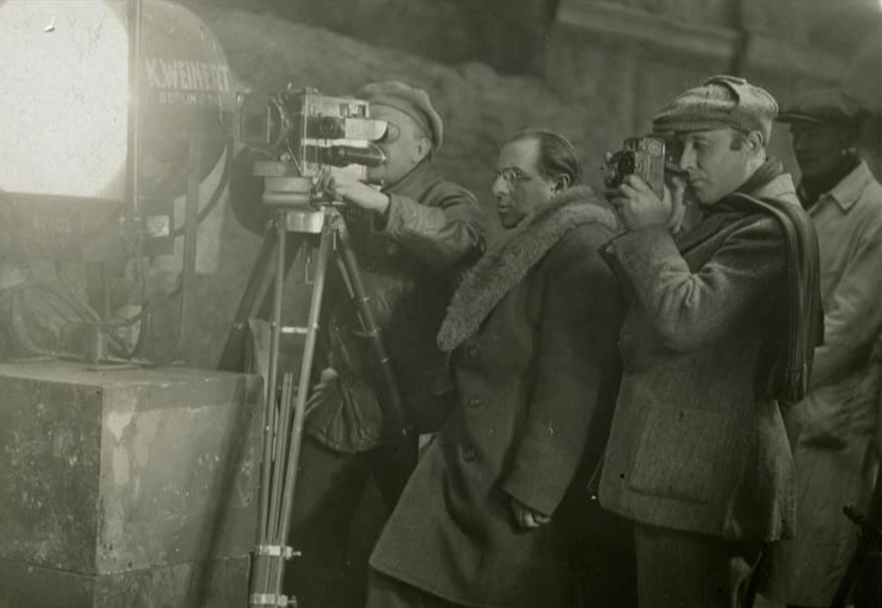 G. W. Pabst (center) during filming, Guido Seeber behind the camera.
